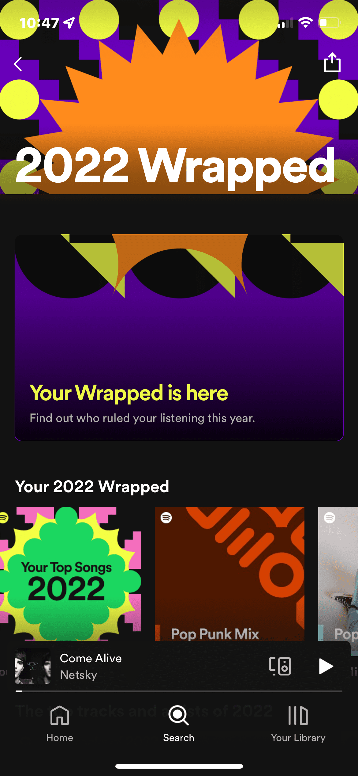 Screenshot of the main 2022 Wrapped screen on Spotify for Android. The screen displays an introduction to the user’s 2022 Wrapped experience and prompts the user to click to see a summary of their listening habits and top artists for the year 2022.