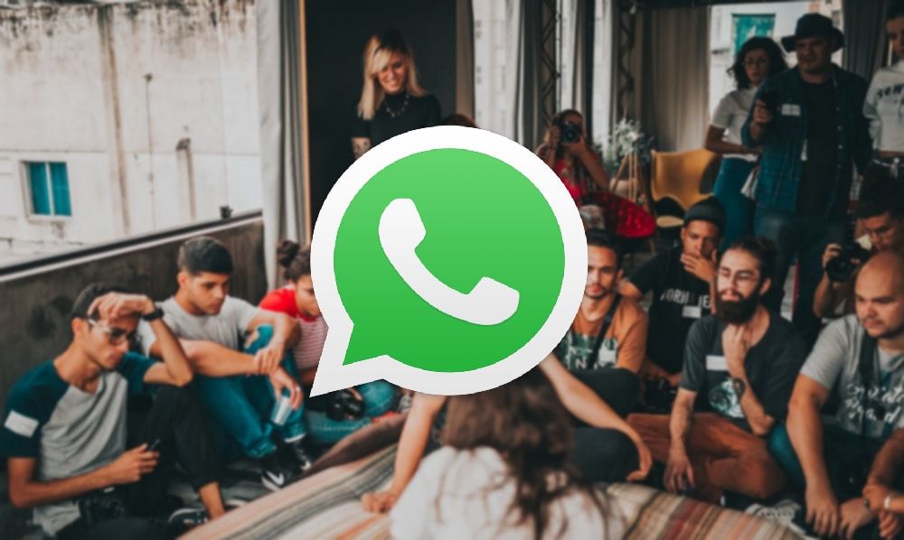 Group of people sitting on the floor WhatsApp hero