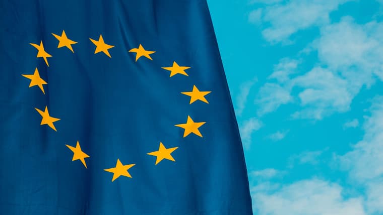 The EU flag against a blue sky