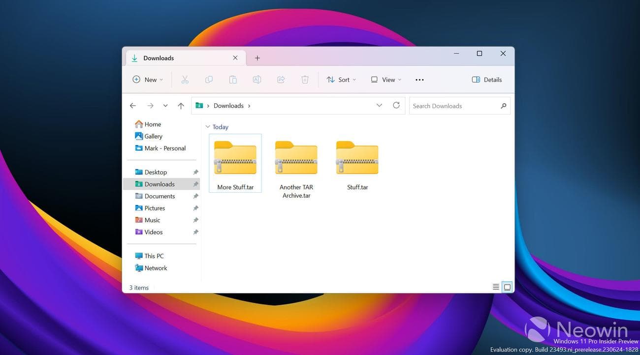 Ένα στιγμιότυπο οθόνης που δείχνει τα αρχεία Εξερεύνηση αρχείων και TAR των Windows 11s