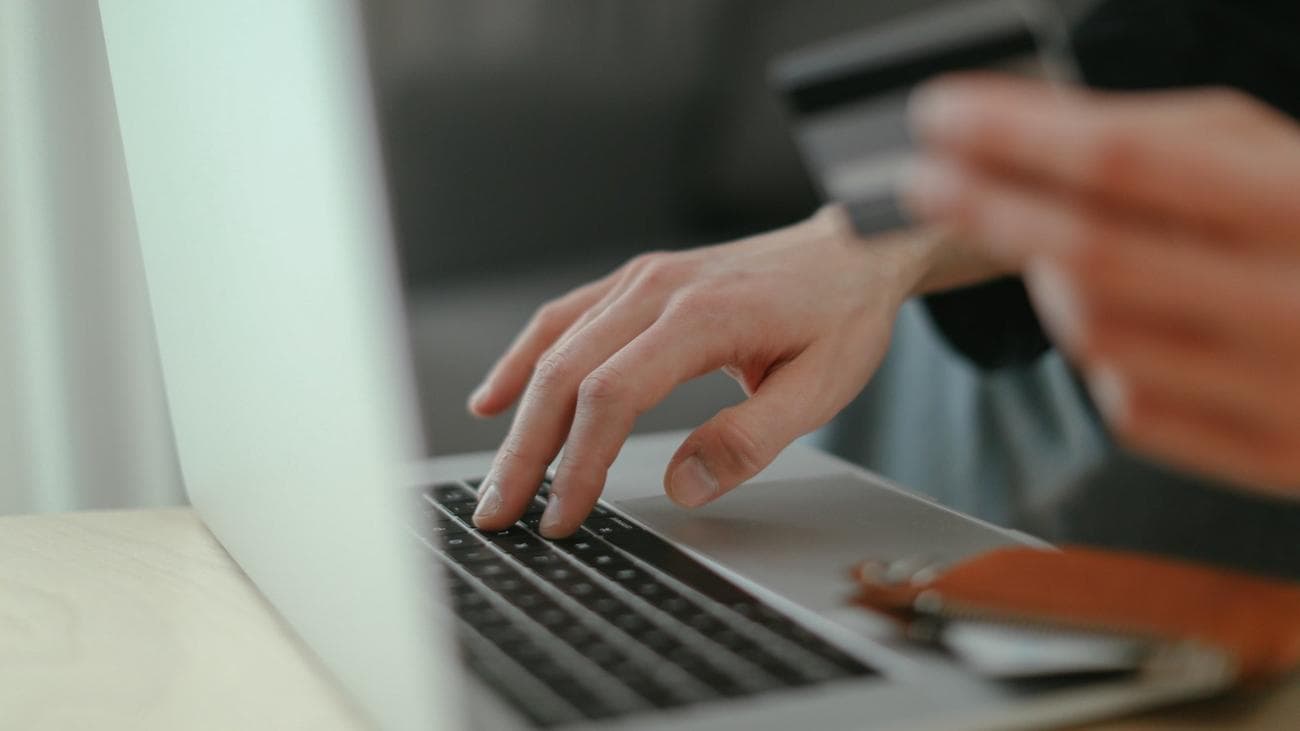 Person making online purchase.