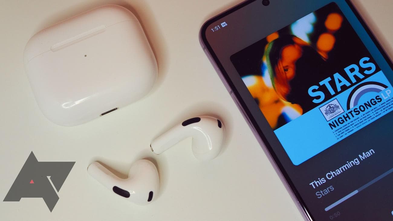 apple-airpods-3-buds-and-case-closeup-with-android-apple-music