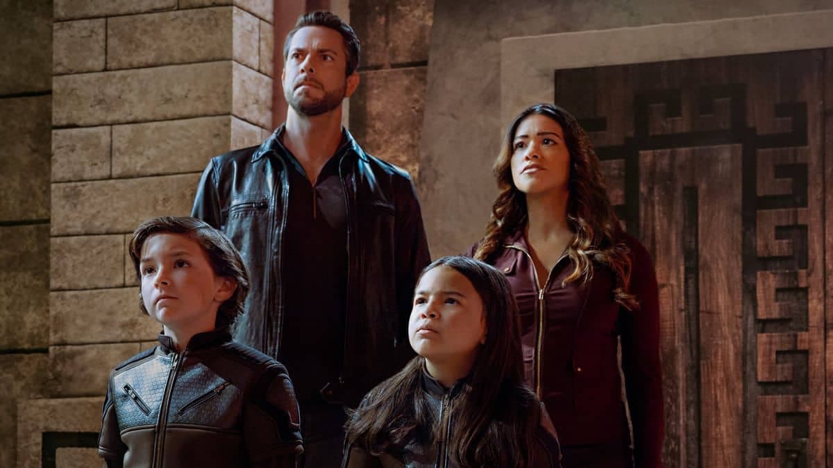 The Torrez family stare at something off-camera in Spy Kids: Armageddon on Netflix, one of the new Netflix movies