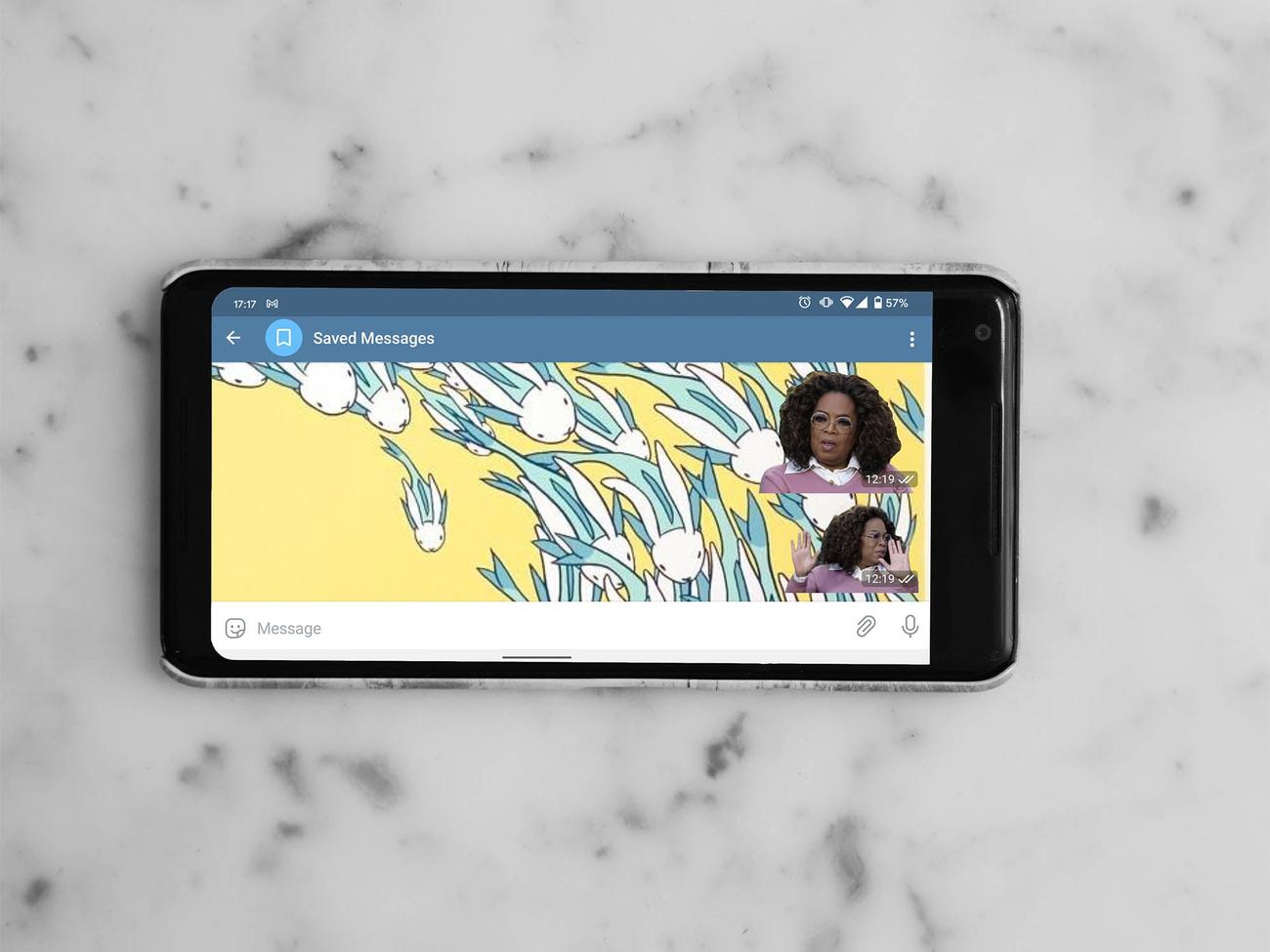 Android phone on marble table.