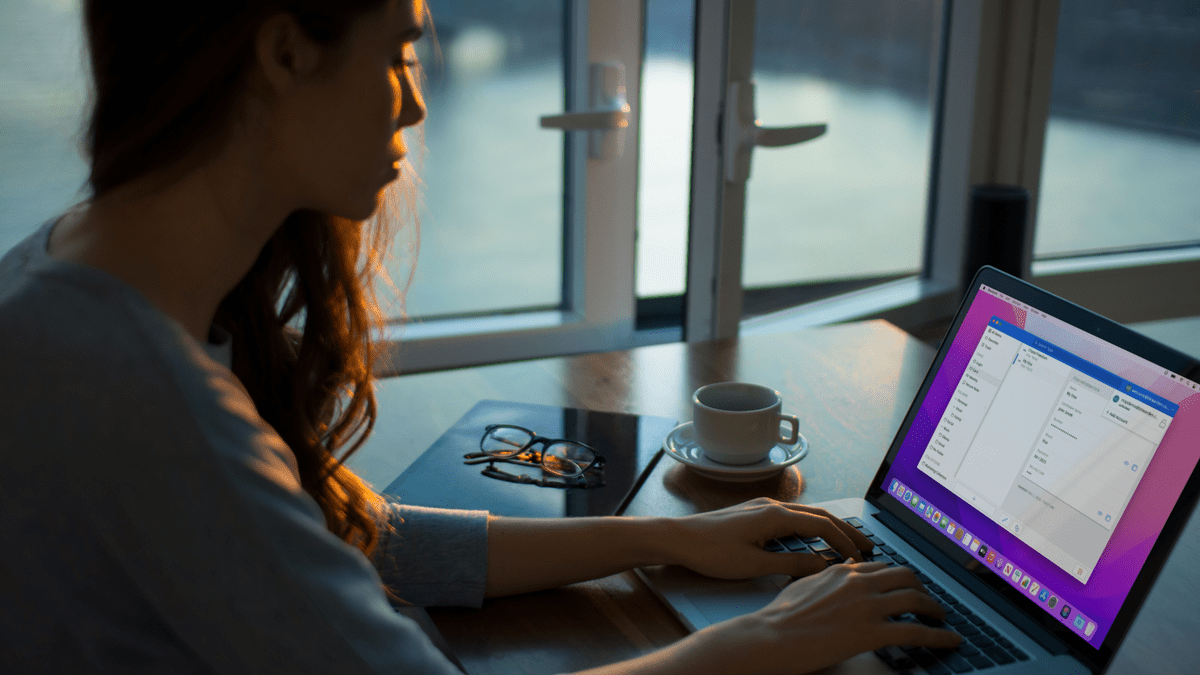 Person using Bitwarden on laptop