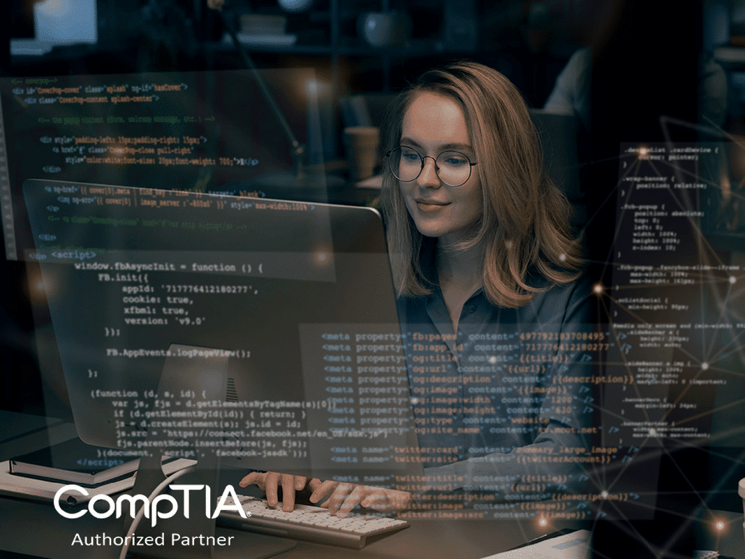 A person coding at a laptop