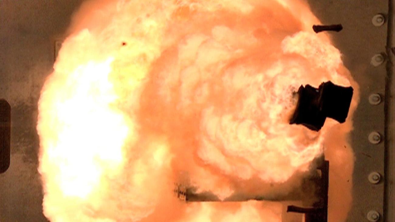 This striking image is from a high-speed camera used to photograph a US railgun in action in 2012. This Virginia-based railgun was funded by the Office of Naval Research.