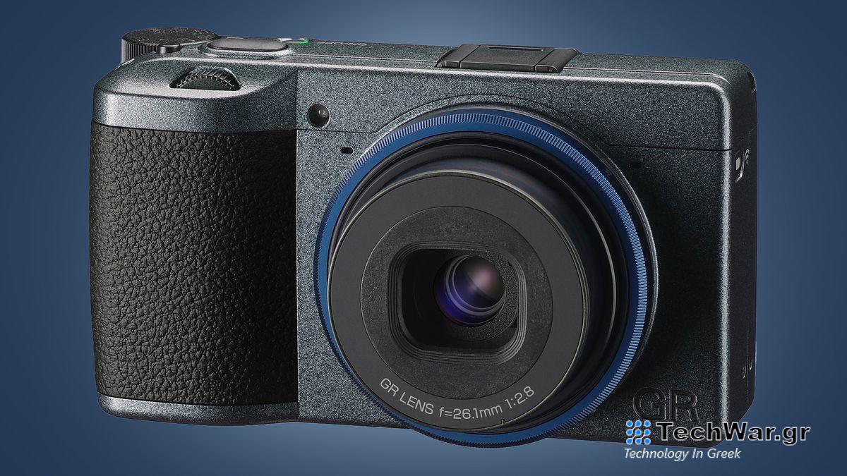 The RIcoh GR IIIx urban edition camera on a blue background