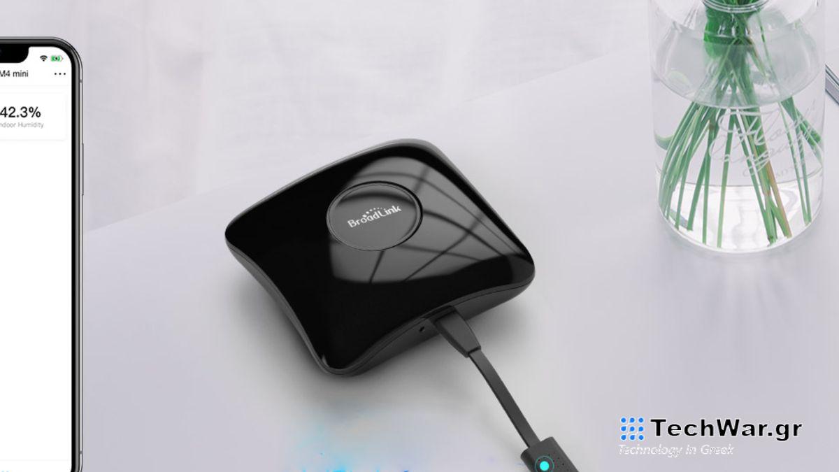 Broadlink RM4 Mini sitting on desk