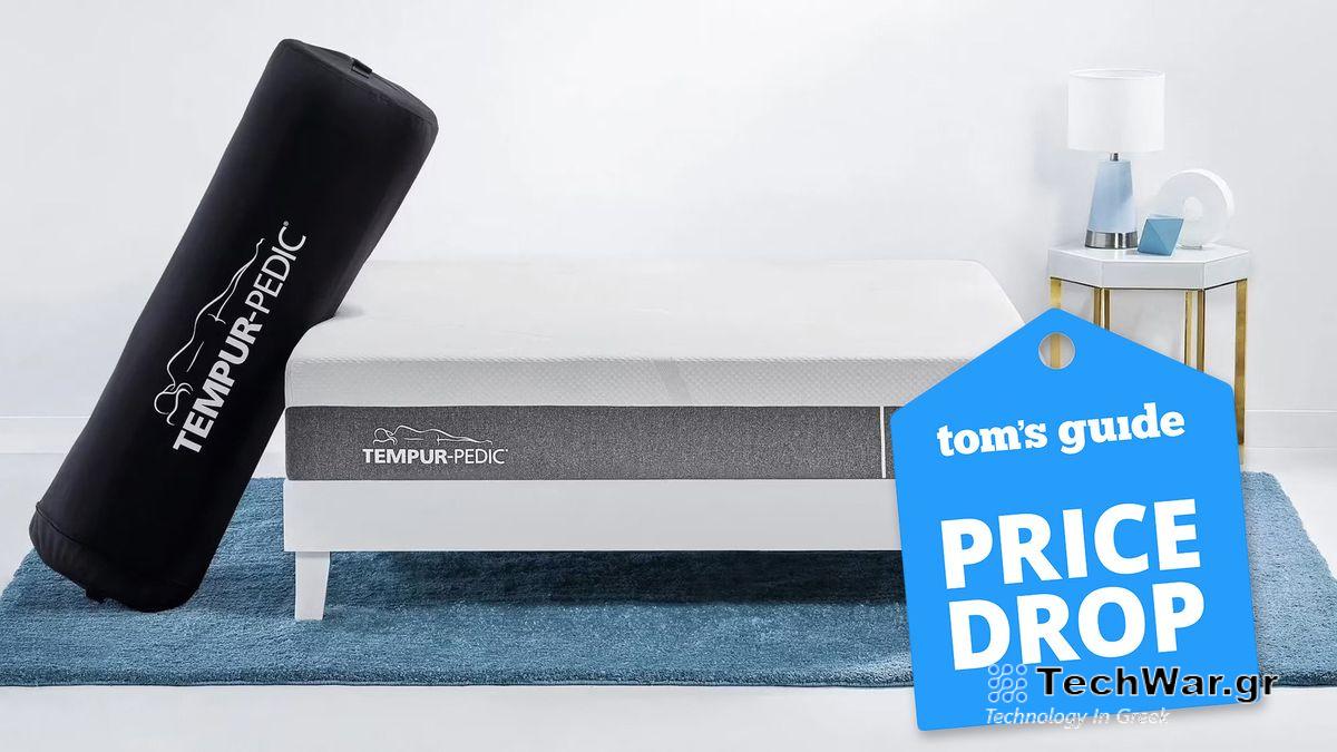 The Tempur Cloud Mattress on a white bedroom in a white bedroom