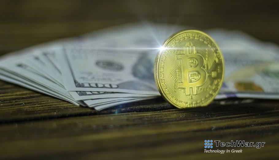 Bitcoin και δολάρια © Pixabay