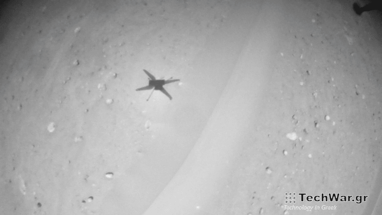 Black and white aerial shot of Mars Ingenuity helicopter in flight