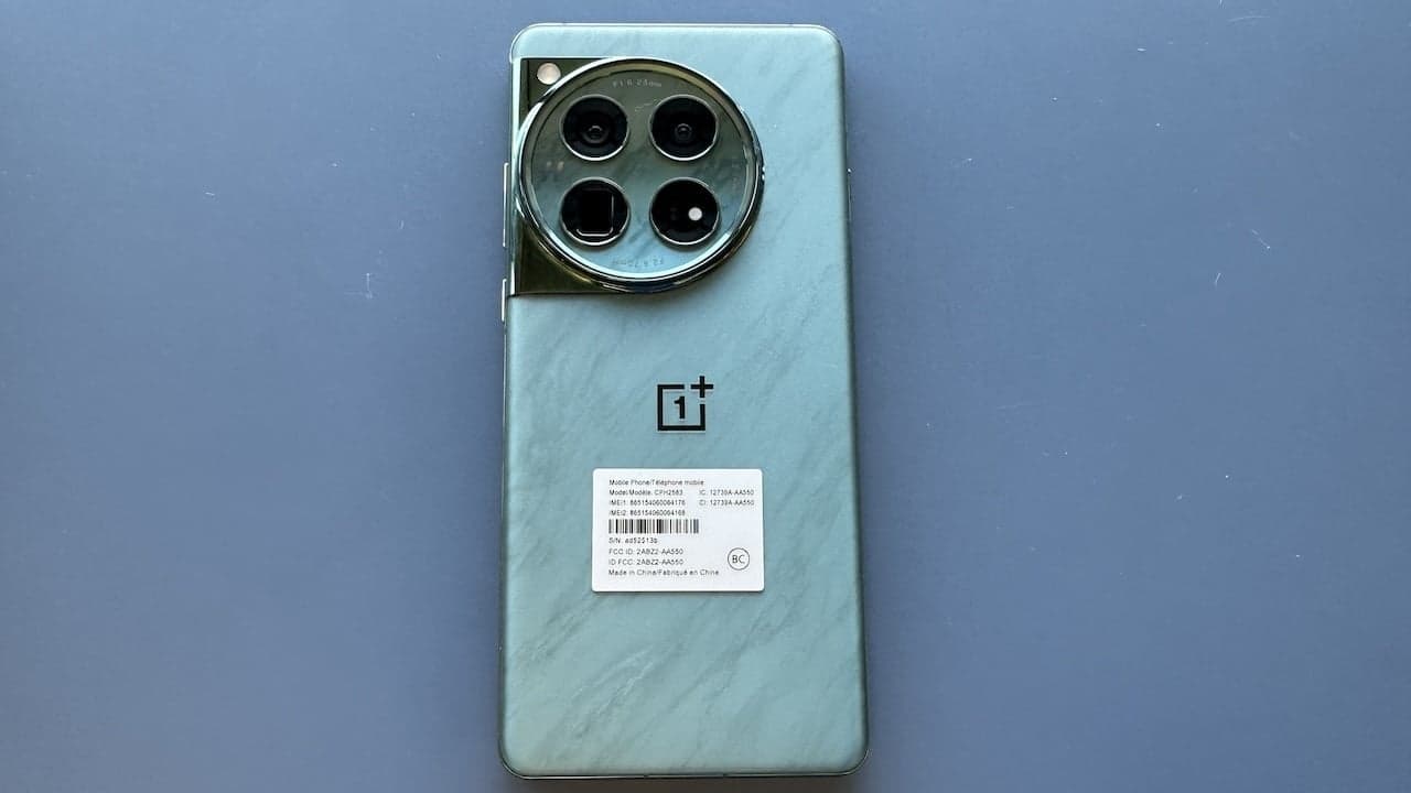 OnePlus 12 on a blue background