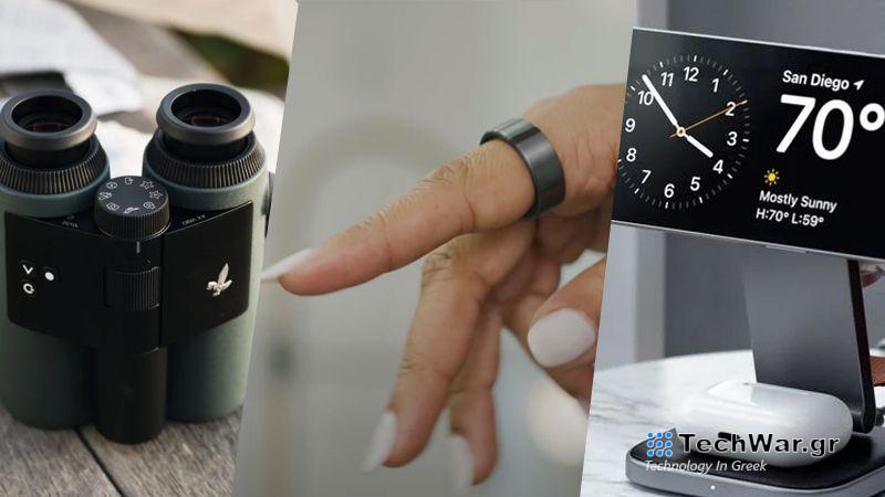 A pair of binoculars, hand with a smart ring and iPhone stand