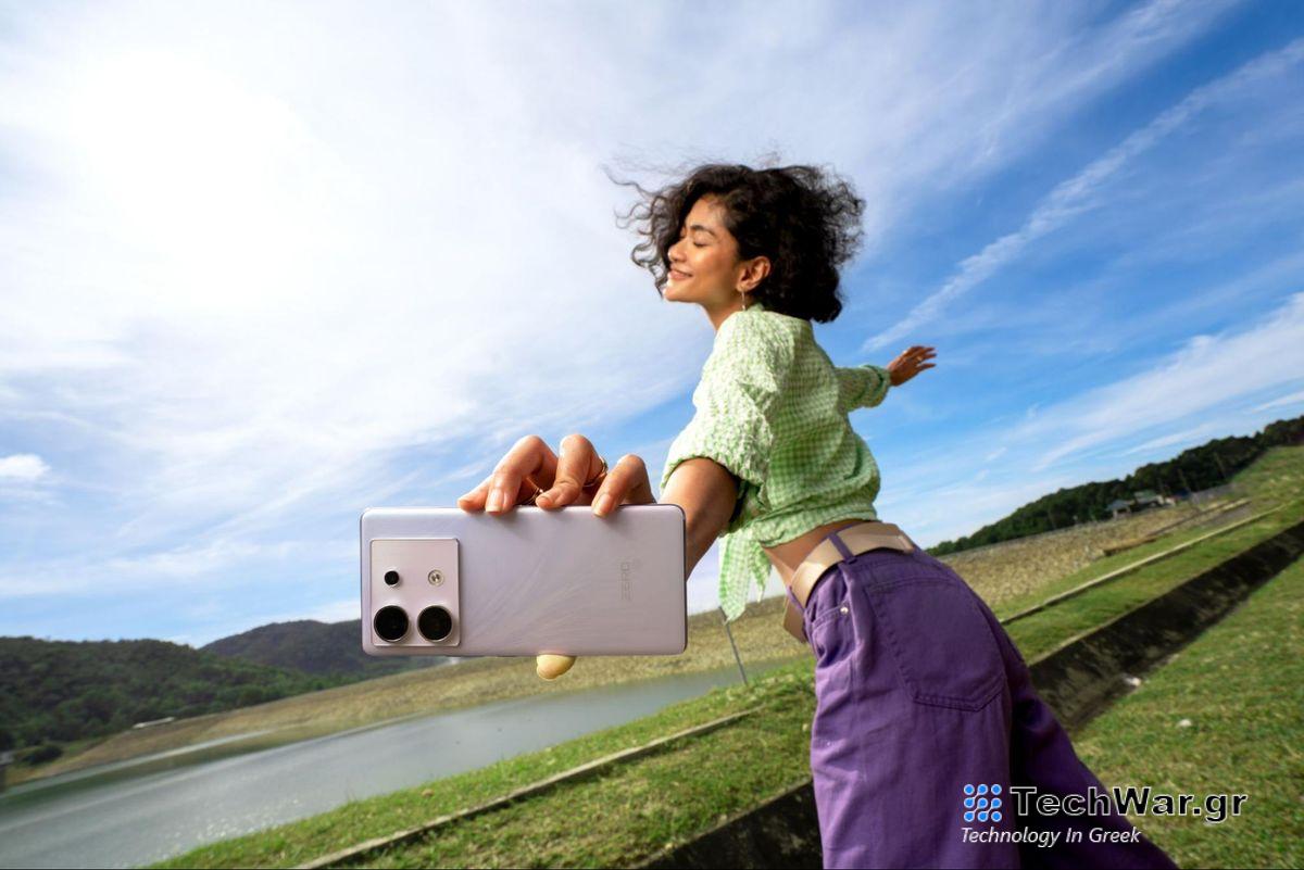 Woman with Infinix ZERO 30 5G smartphone