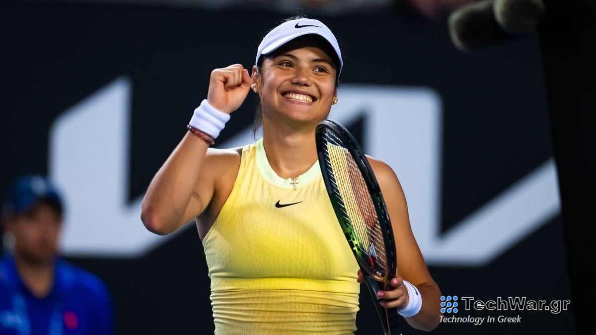 Emma Raducanu, wearing a yellow Nike tennis dress and white visor, pumps her fist prior to the Australian Open 2024 Raducanu vs Wang live stream
