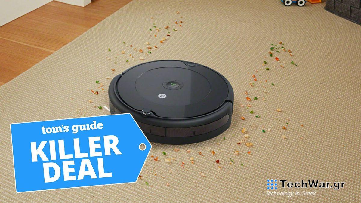 A photo of the Roomba 694 on a carpet with the "Tom