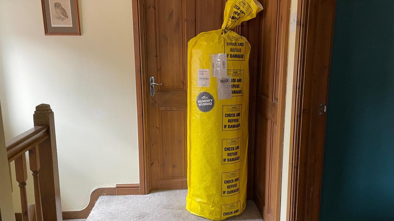 The REM-Fit Pocket 1000 Mattress at the top of our tester's steps