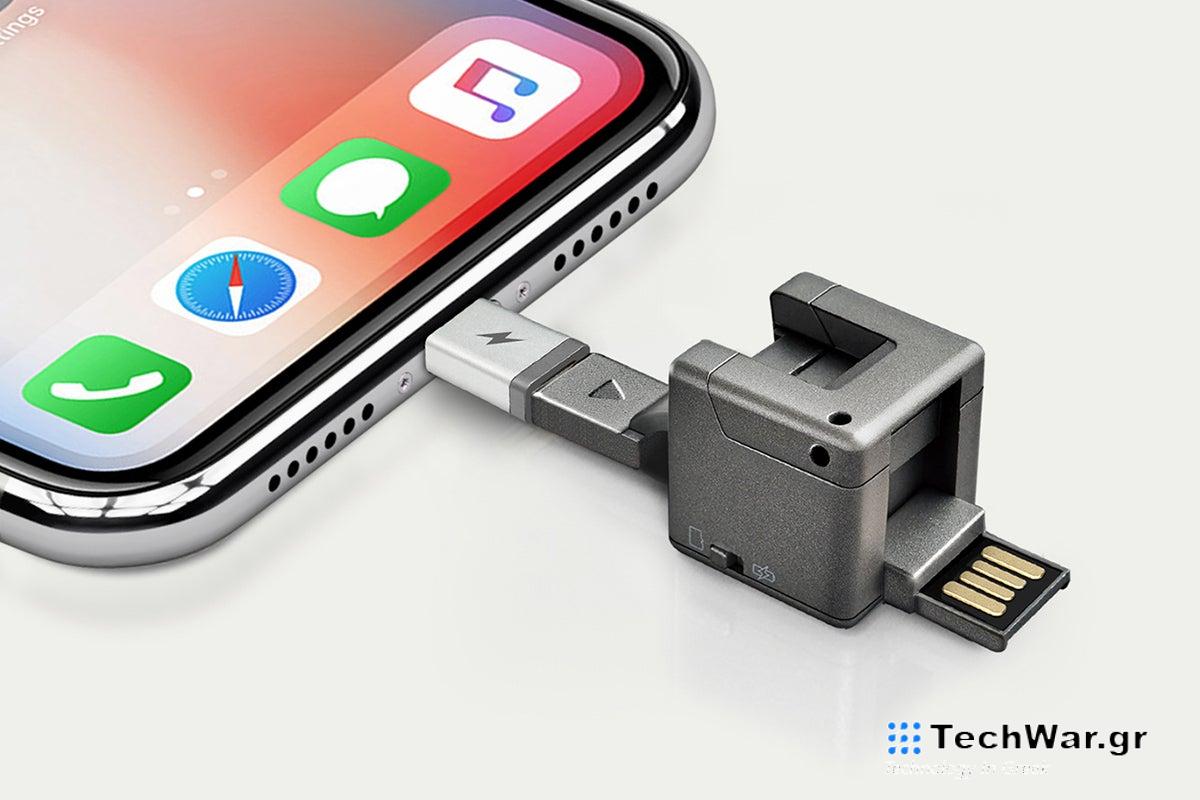 A all-in-one mobile key ring on a plain background.