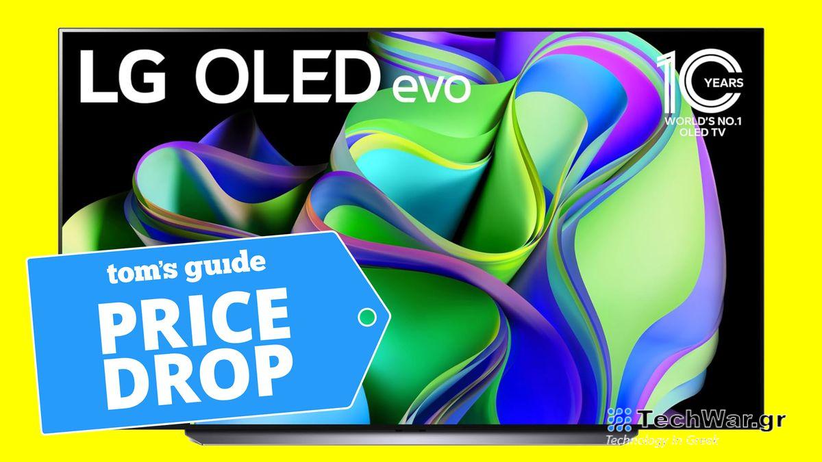 LG C3 OLED TV against yellow backdrop