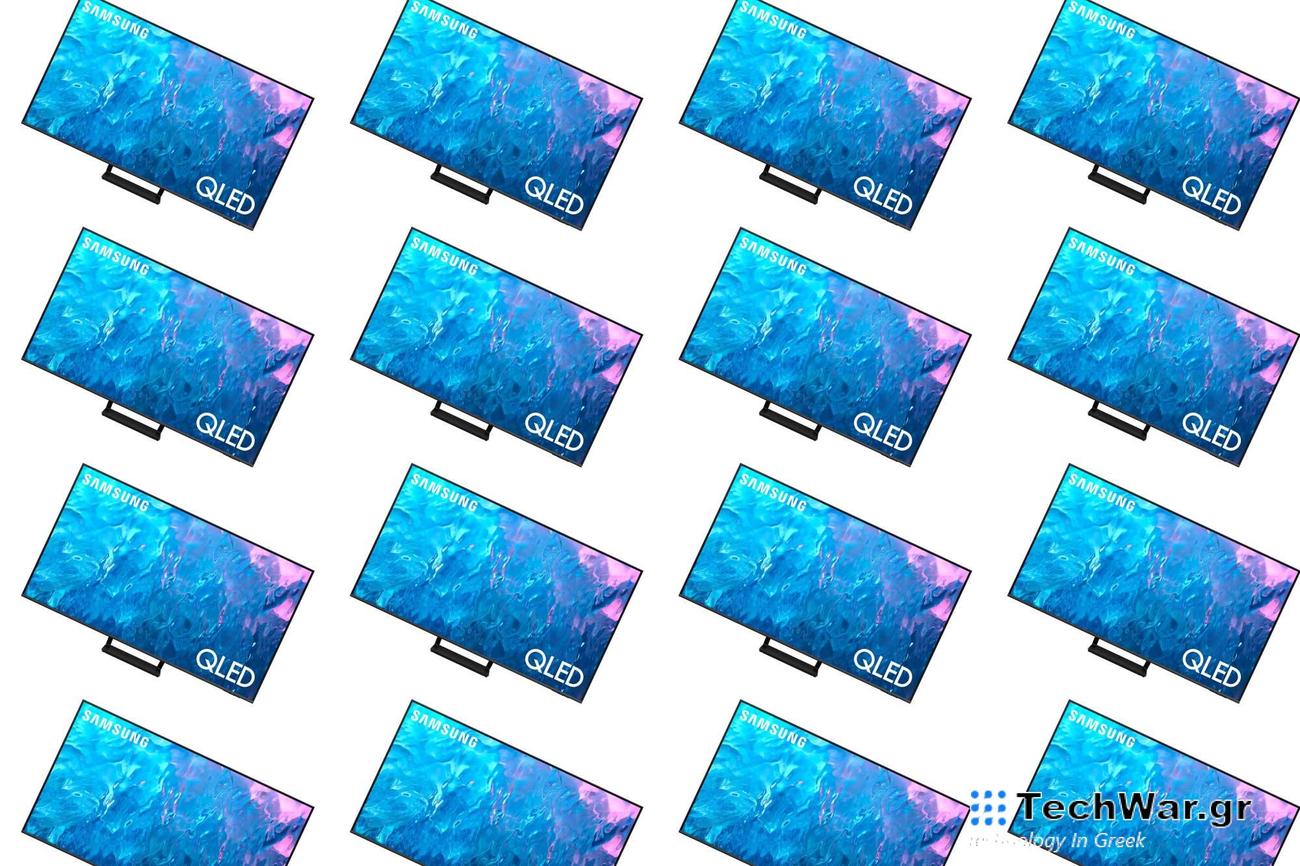 A Samsung qLED TV on a diagonal pattern on a plain background