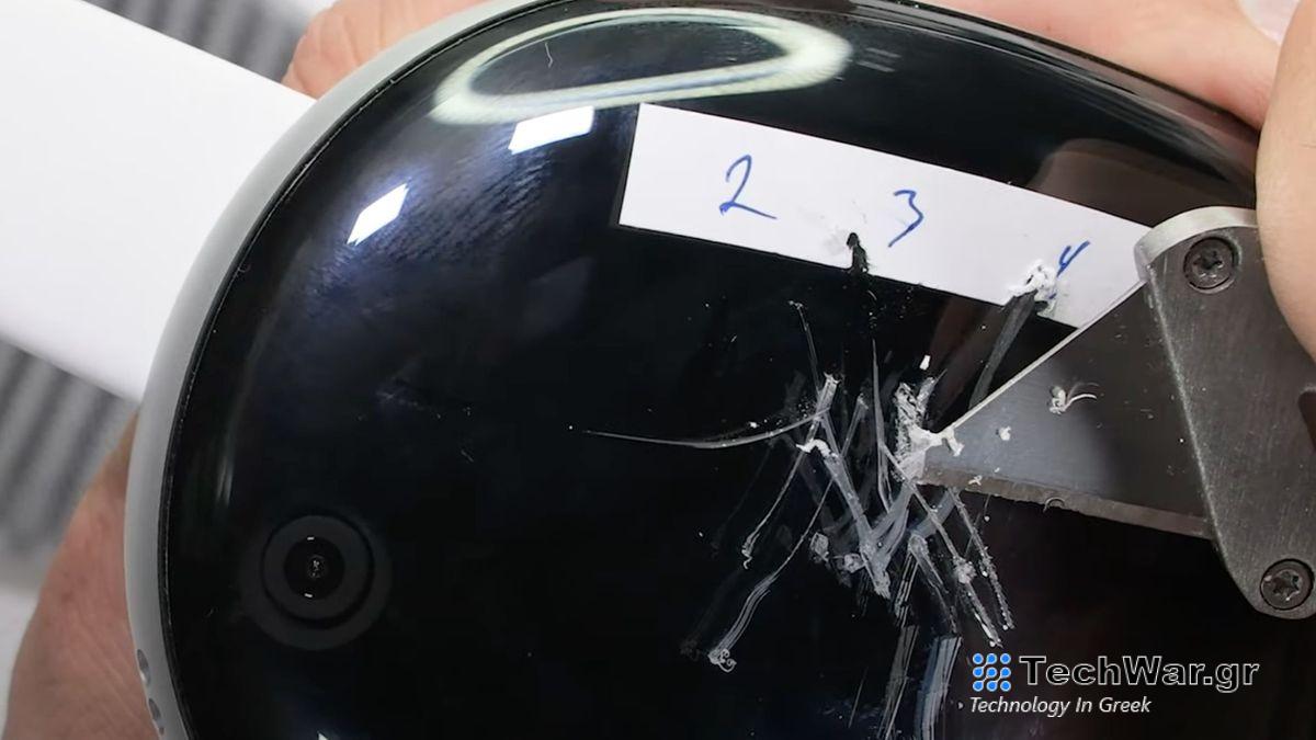 JerryRigEverything scratching up his Vision Pro