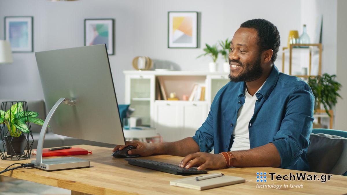 A person using a desktop computer.