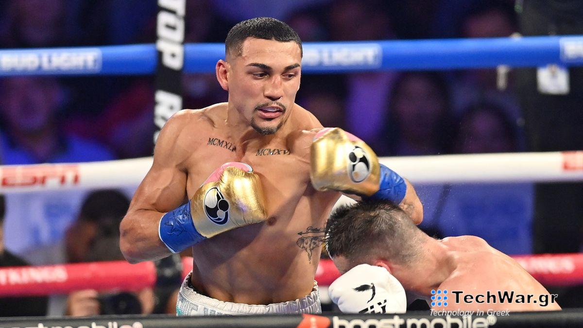 Teofimo Lopez, wearing gold gloves and blue tape, unleashes a flurry of punches on an opponent in a boxing ring ahead of the Lopez vs Ortiz live stream.