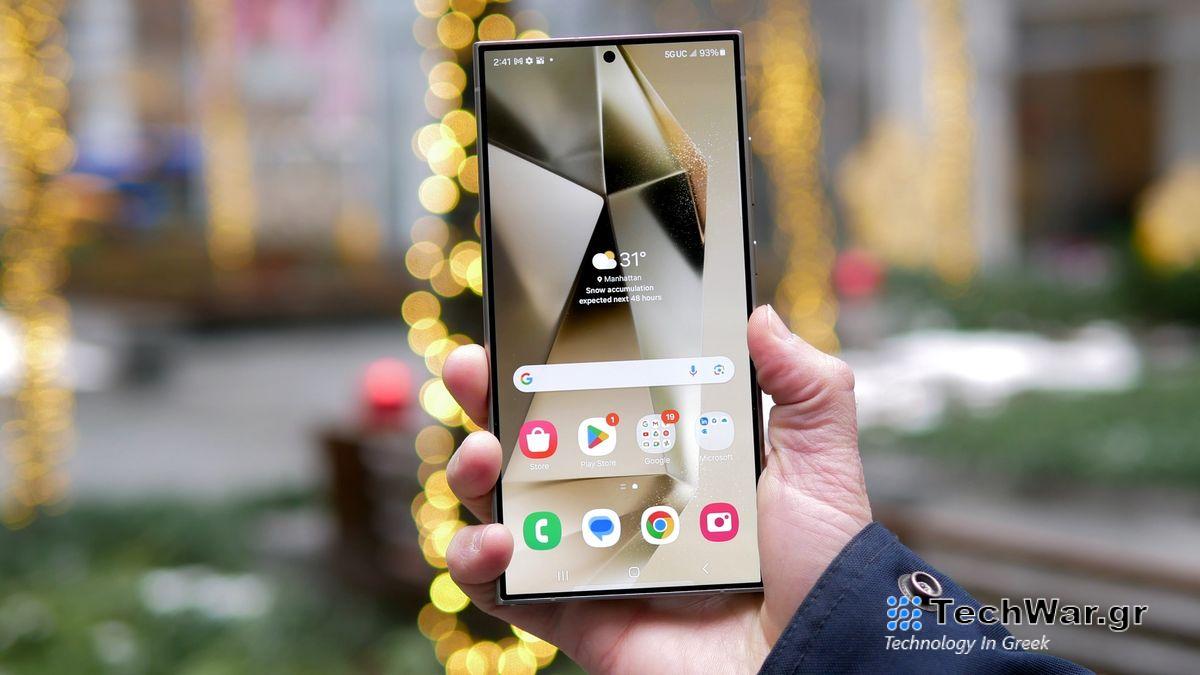 Samsung Galaxy S24 Ultra in hand showing display and home screen