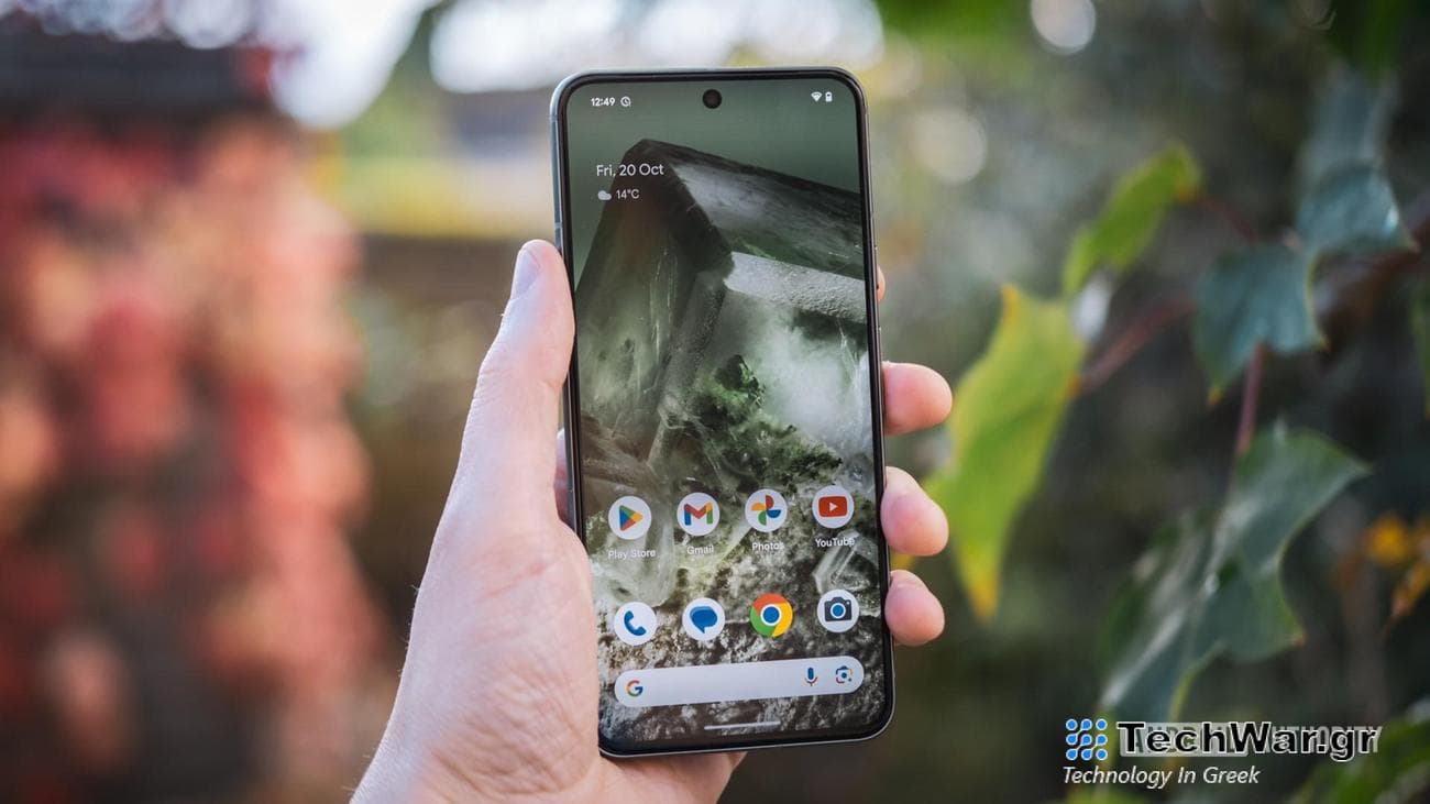 Google Pixel 8 homescreen in hand outdoors