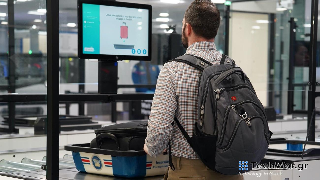 Passenger staying at self-scan TSA station