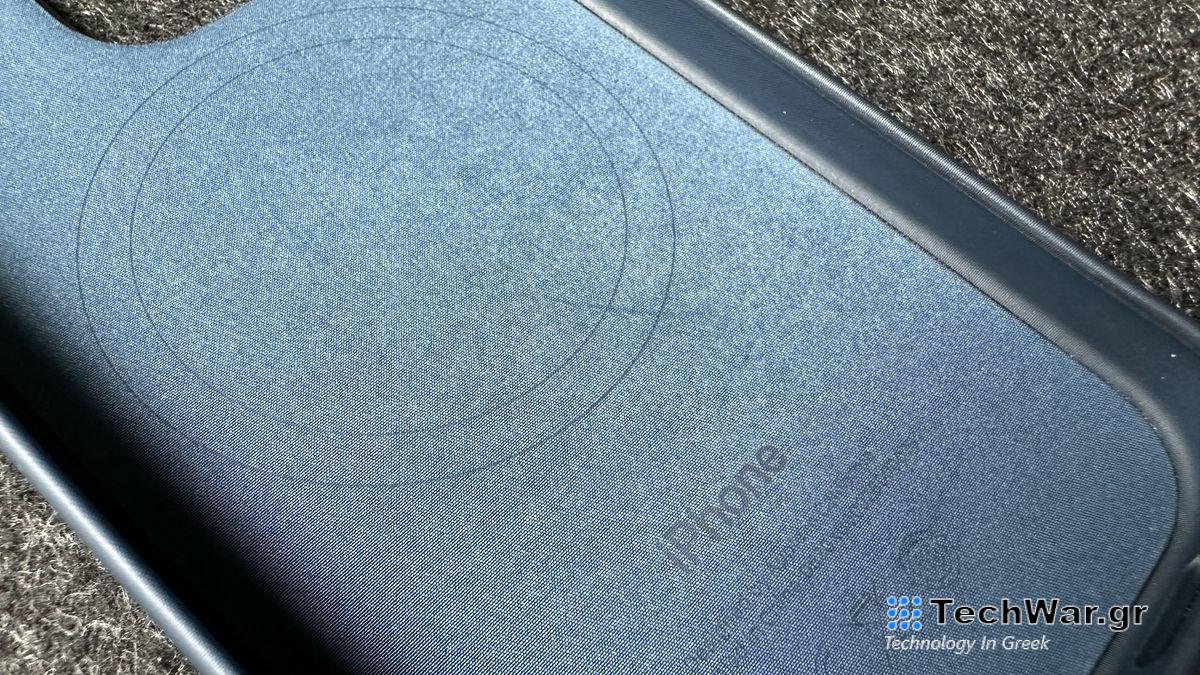 The iPhone 15 Pro with a Pacific Blue Apple FineWoven case on.