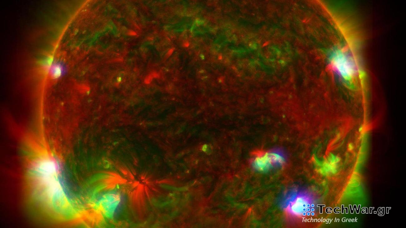 This composite image of the Sun includes high-energy X-ray data from NASA's Nuclear Spectroscopic Telescope Array (NuSTAR) shown in blue; lower energy X-ray data from the X-ray Telescope (XRT) on the Japanese Aerospace Exploration Agency's Hinode mission shown in green; and ultraviolet light detected by the Atmospheric Imaging Assembly (AIA) on NASA's Solar Dynamics Observatory (SDO) shown in red.