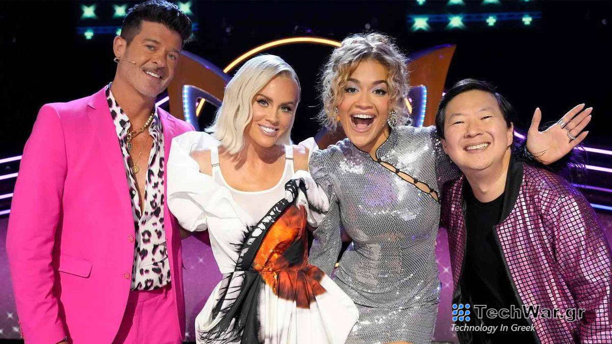 Panelists Robin Thicke, Jenny McCarthy-Wahlberg, Rita Ora and Ken Jeong pose in a promotional shot for The Masked Singer season 11