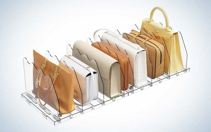 A clear SPACEKEEPER acrylic purse holder on a plain background.